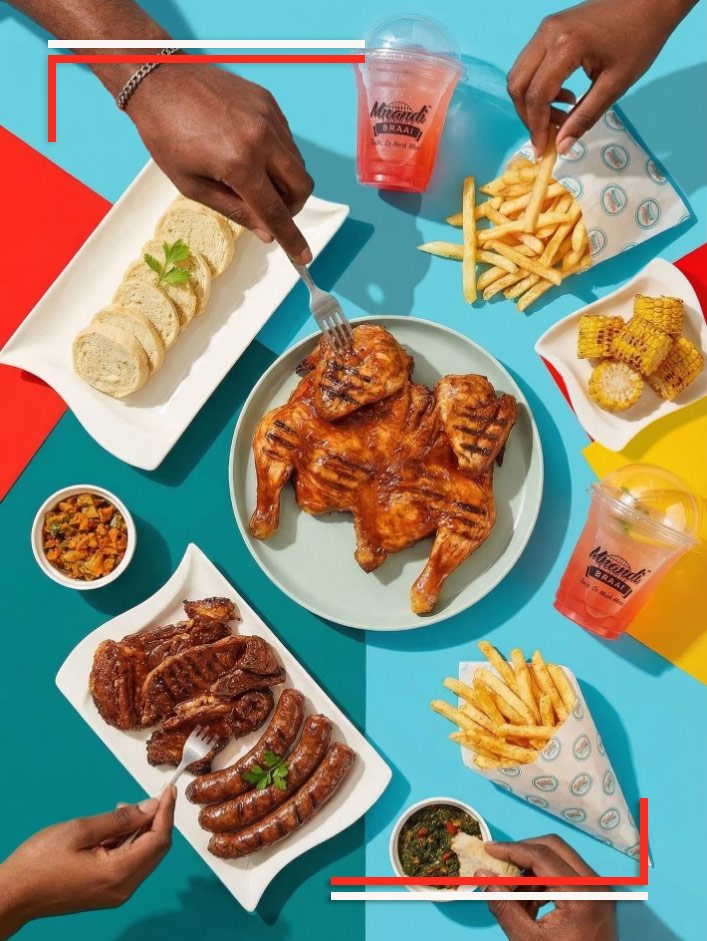 A Mnandi Braai feast shared around the table
